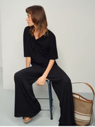 TEASEL Cooling Wide Leg Trousers in Black - On Female Model