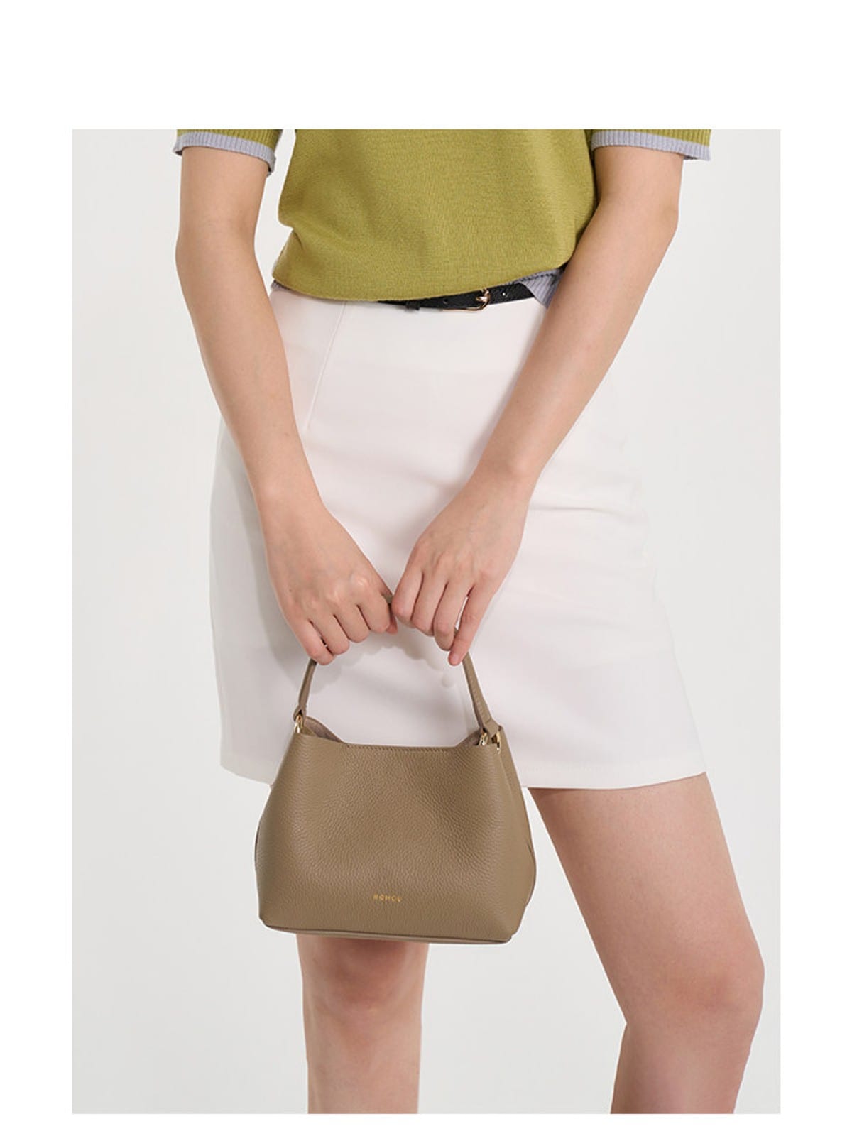 HONGU Cowhide Crossbody Bucket Bag in Taupe - On Female Model