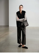 MSBEAST Cropped Wide Leg Leather Trousers in Brown - On Female Model