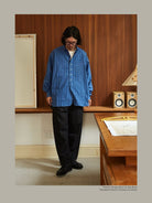 USAGE Heavily Washed Selvedge Denim Jeans in Black - On Male Model