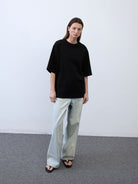 Random Piece Cotton Drop Shoulder T Shirt in Black - On Female Model