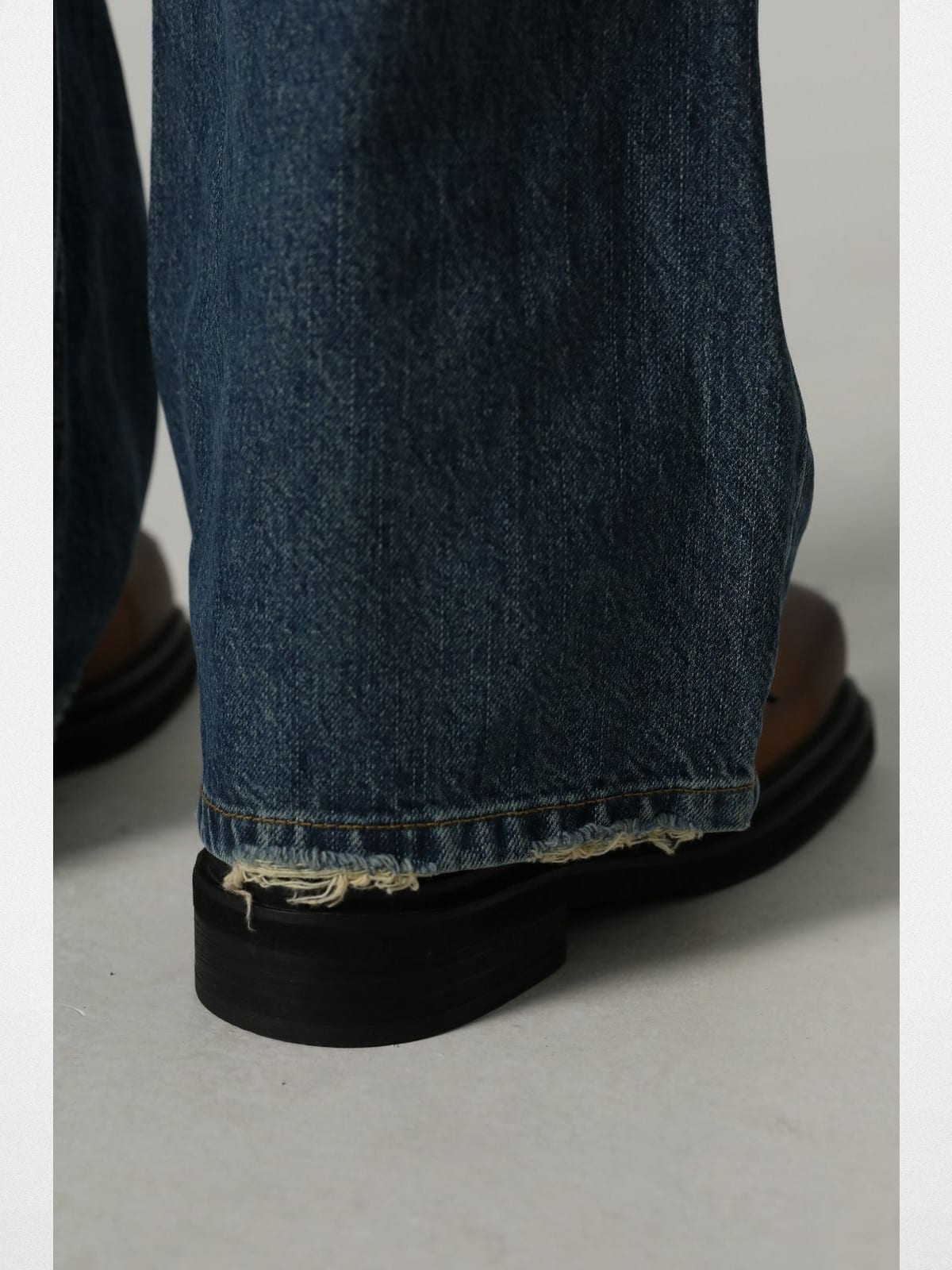 MASONPRINCE High Waisted Distressed Flared Jeans in Navy Blue - On Model