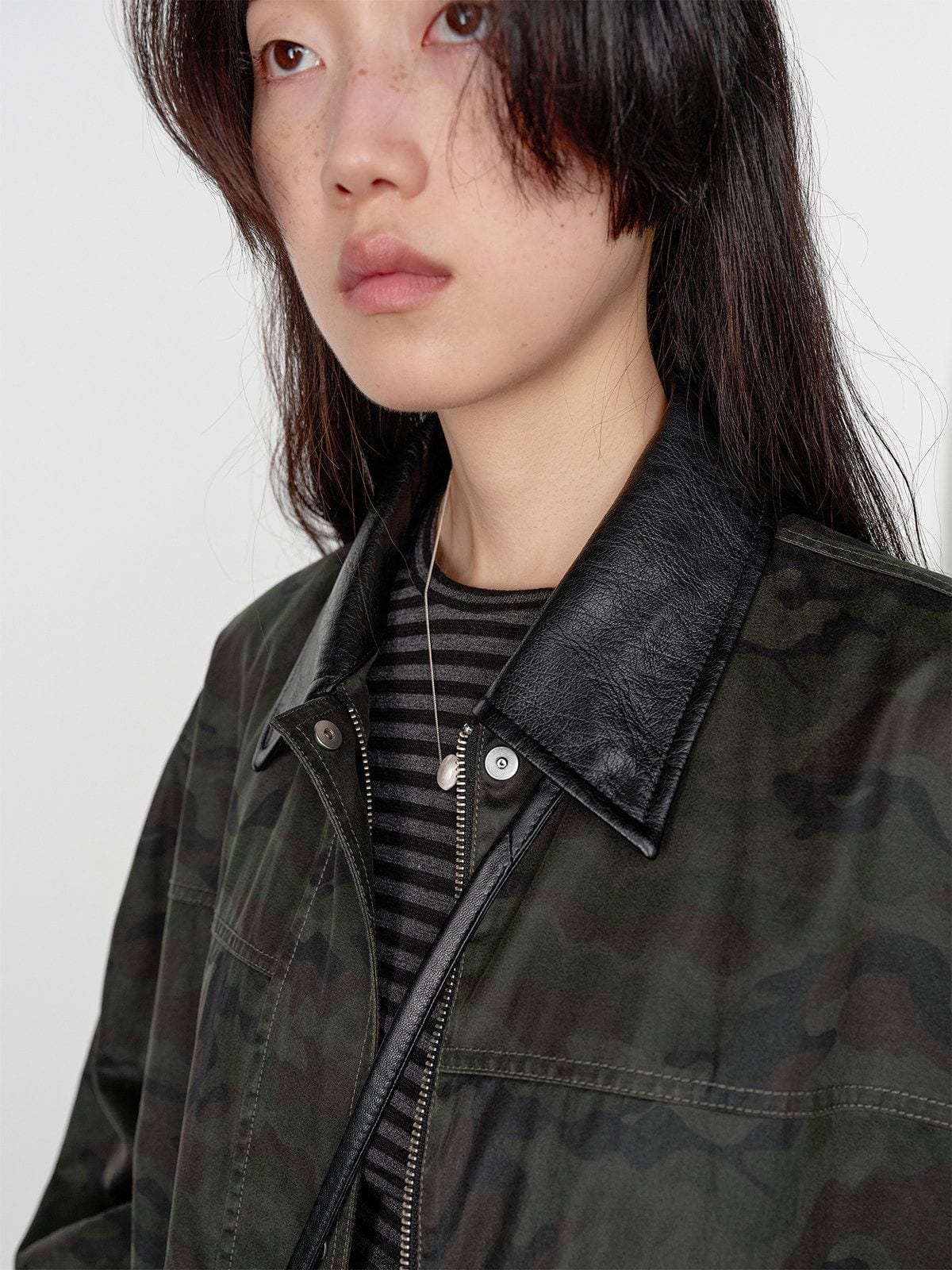 Random Piece Matte Coated Utility Jacket in Army Green - On Female Model