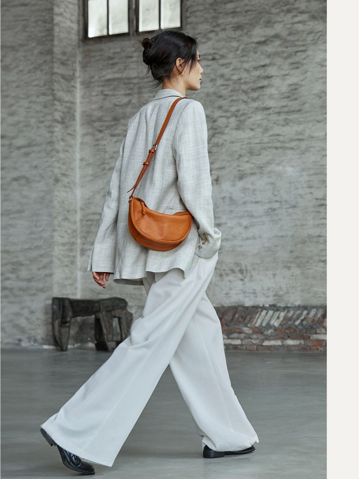 QIUZHEN Vegetable Tanned Leather Crescent Bag in Gray - On Female Model
