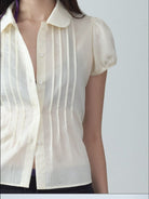 RARELY ALIKE Peter Pan Collar Tie Front Shirt in Cream - On Female Model