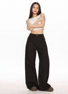 Deconstructed Curved Seam Trousers in Black #pose_variant #color_black - On Female Model